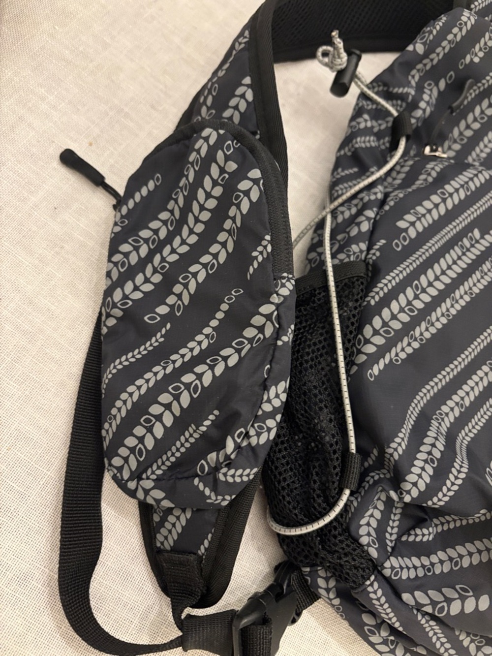 Eddie Bauer Black and Gray Patterned Sling Backpack - Picture 2 of 11